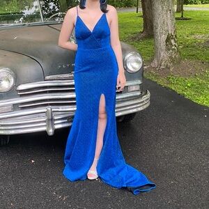 Stunning sparkly blue open back prom dress with slit and train size 0